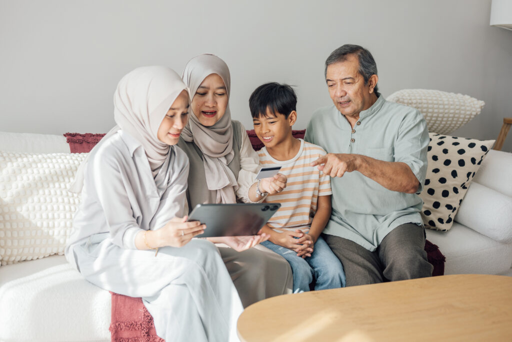 Family using a tablet for Online Health Subscription