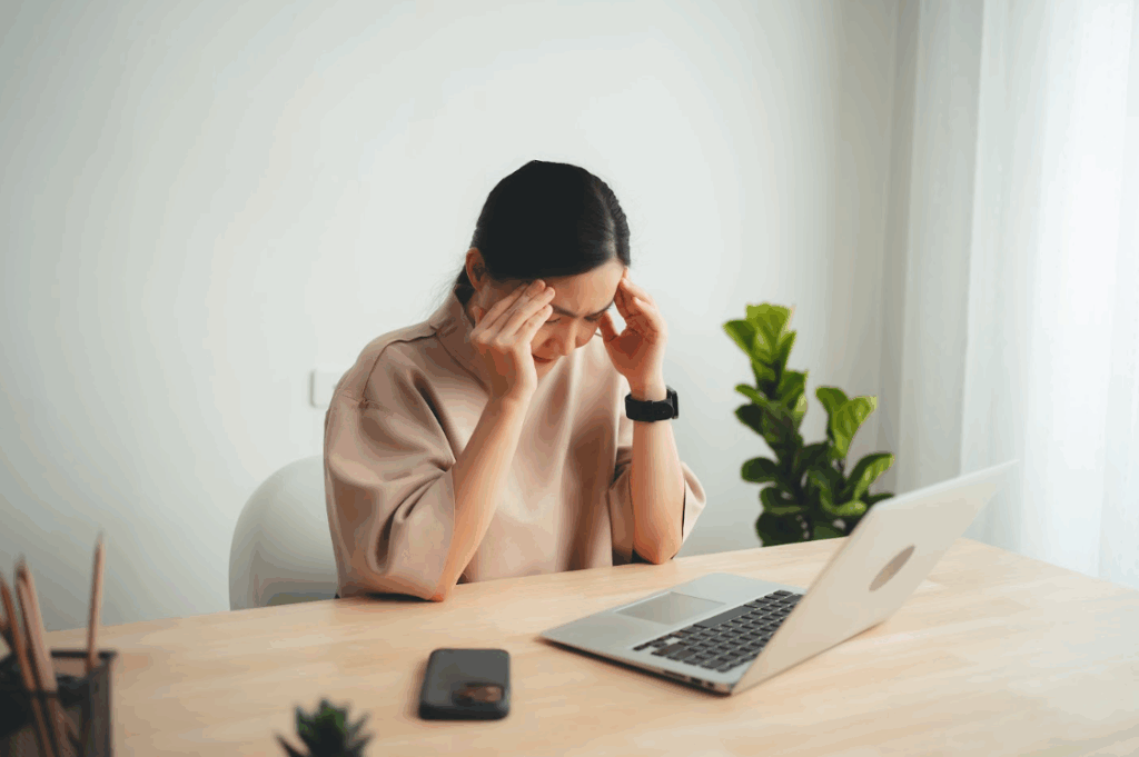 Employee engagement affected by digital fatigue while working on a laptop