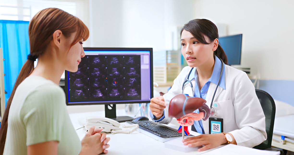 Doctor explains a Fatty Liver scan to a patient