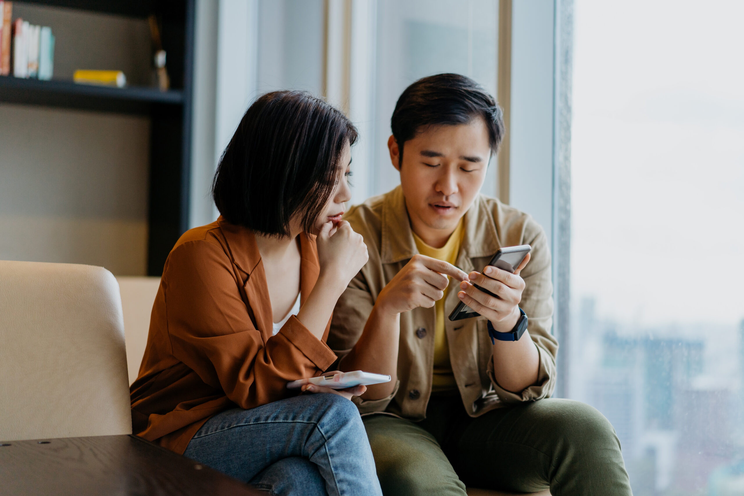 Couple using a mobile app for digital health adoption