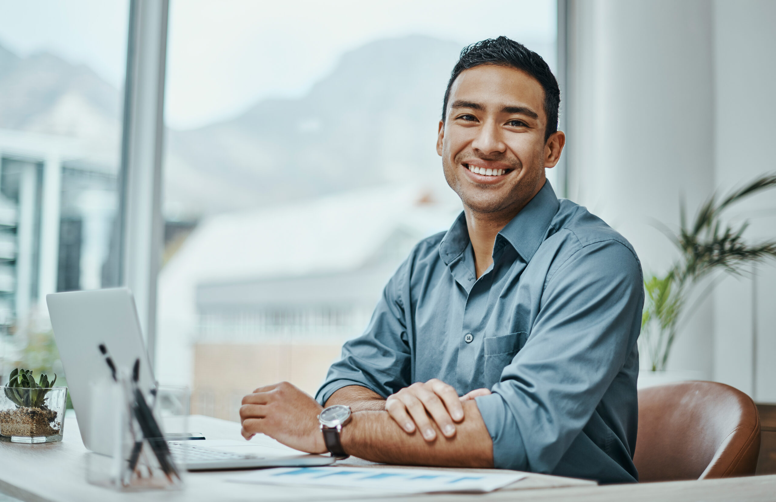 Man using laptop to access affordable healthcare subscription plan