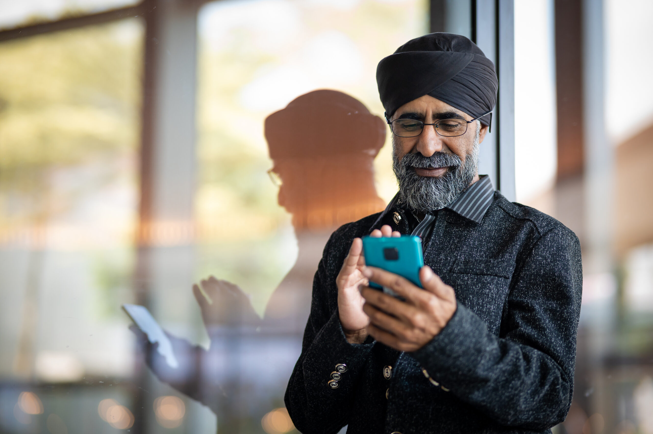 Man using a smartphone for an online doctor consultation